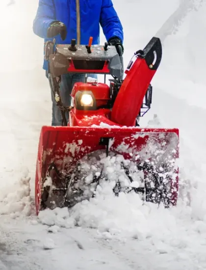 blowing snow off sidewalk